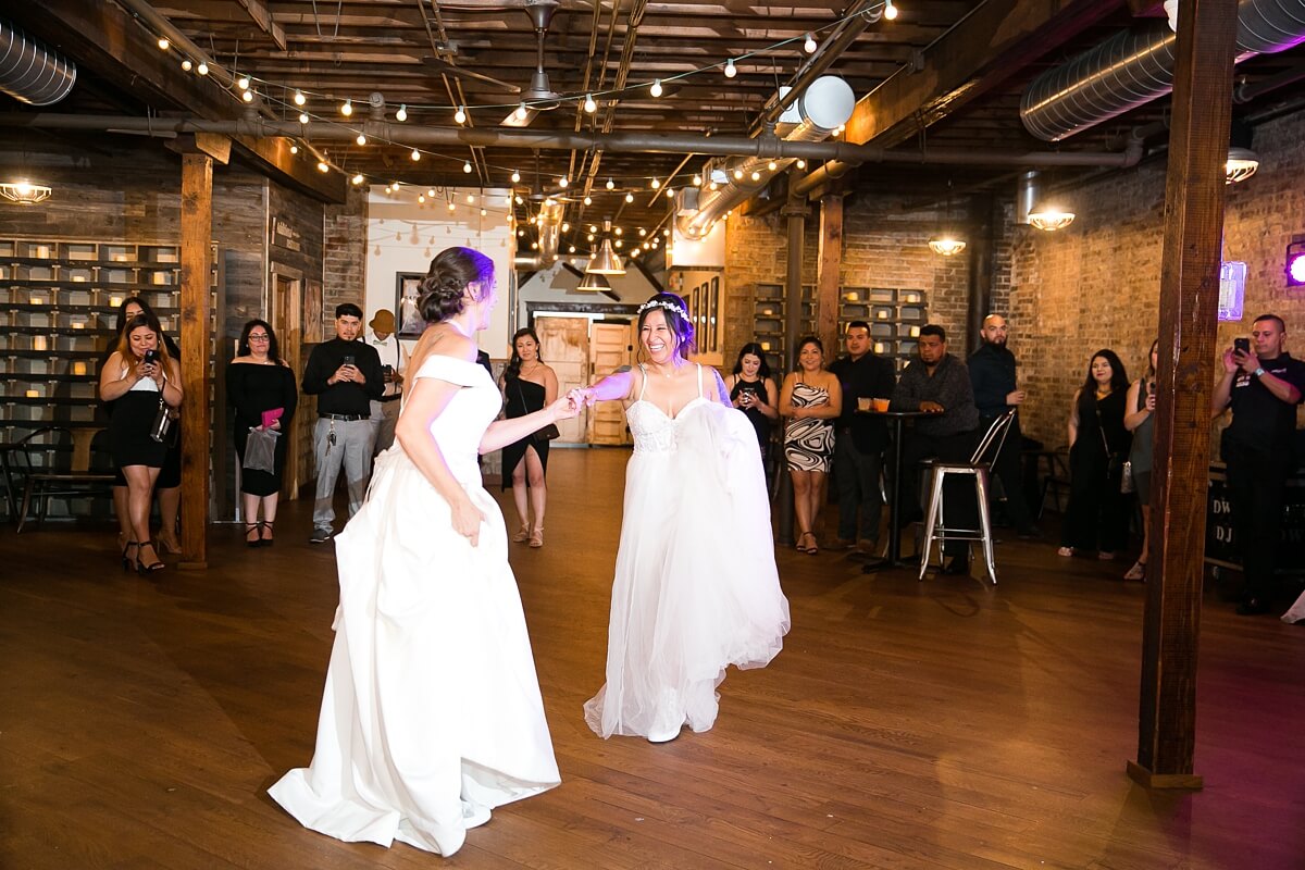 Brides dancing during reception at The Haight