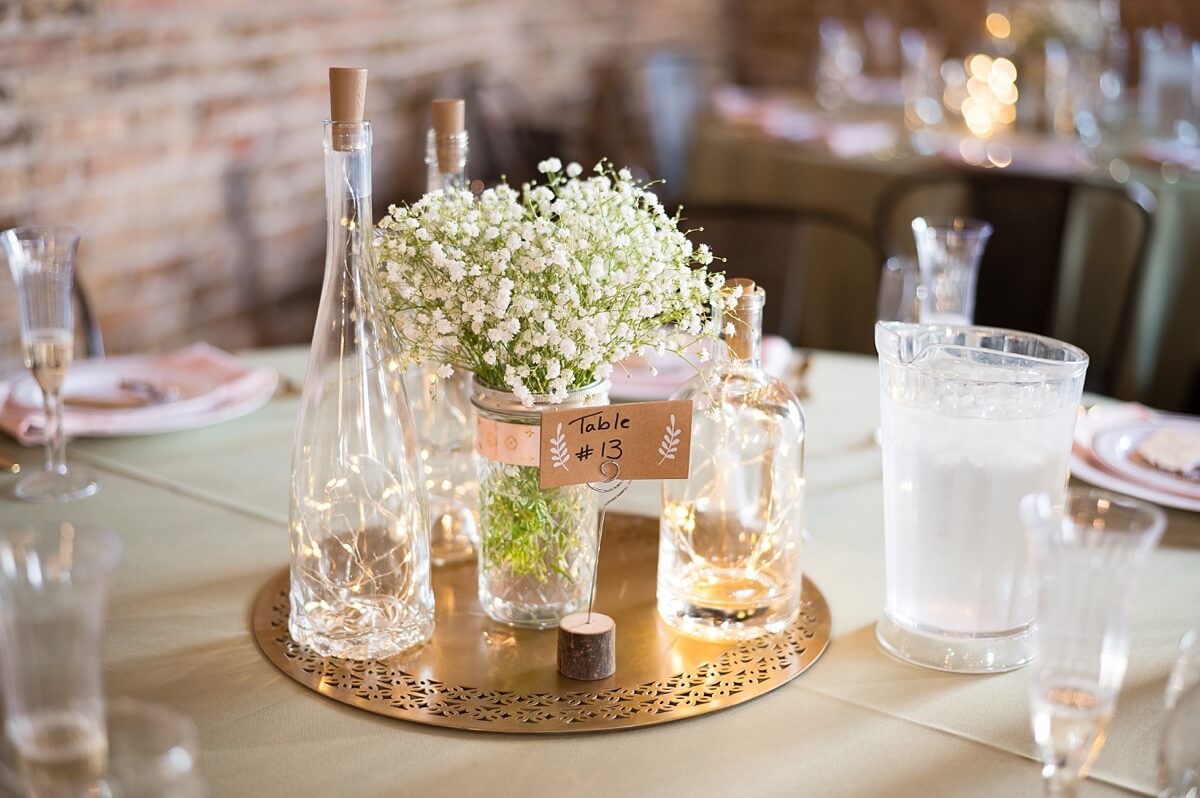 Baby's breath centerpiece with twinkle lights in vases