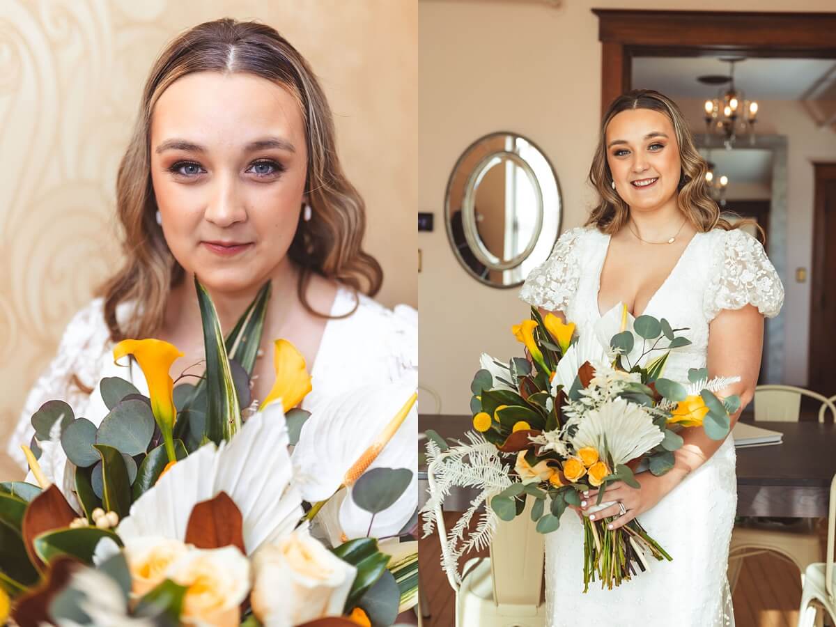 Bride holding bouquet of white and yellow flowers and wearing poofed sleeve dress