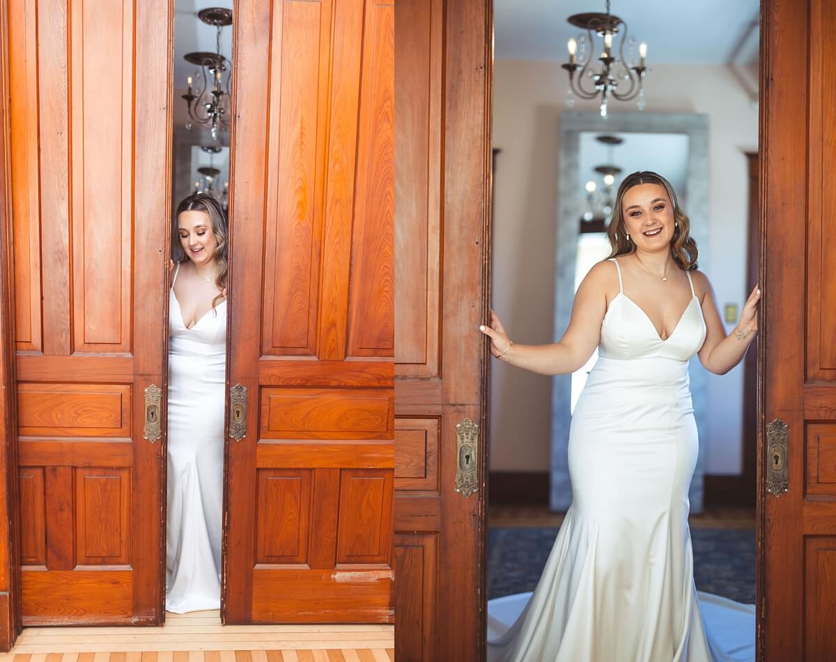 Bride wearing silk wedding dress standing between wooden sliding doors