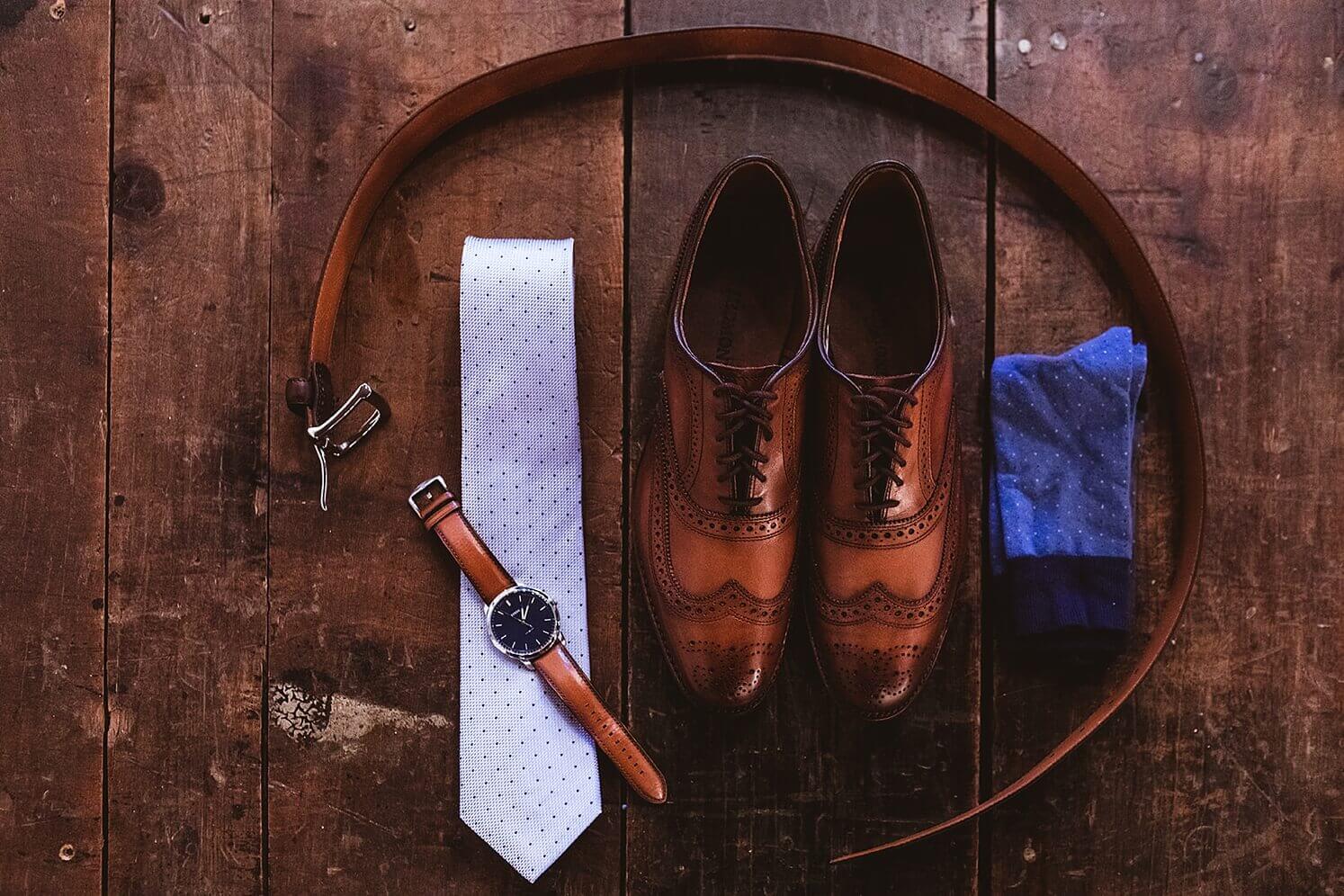 Groom's shoes, tie, watch, and belt