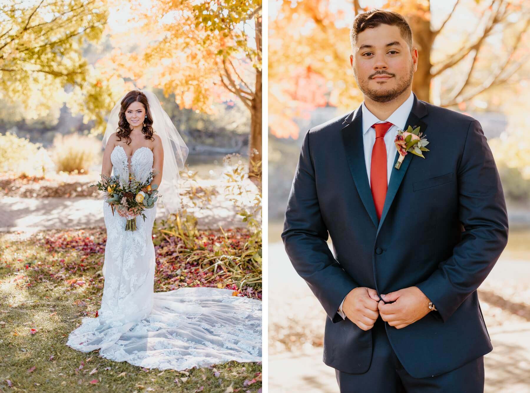 Bride wearing form fitting lace dress holding boho bouquet standing under fall trees | groom in navy blue suit with brick red tie