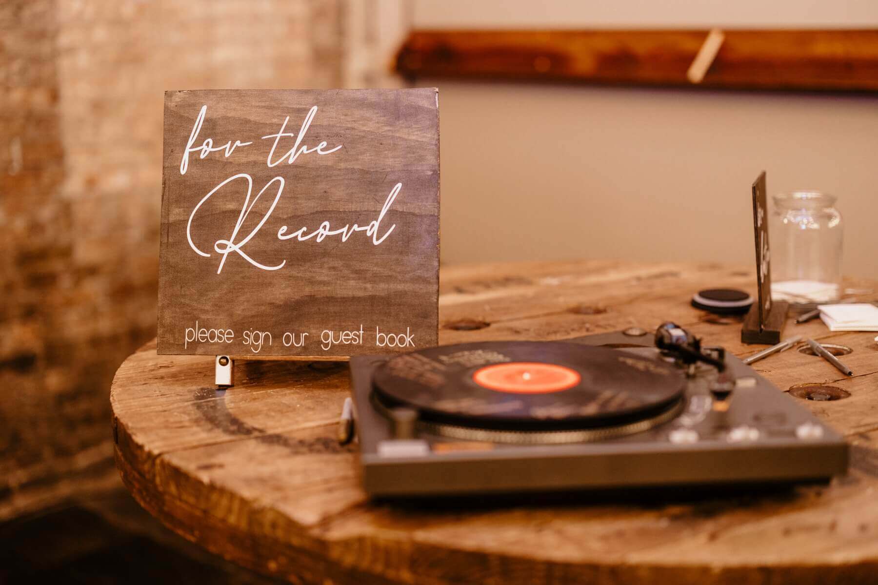 Record player guest book at wedding reception