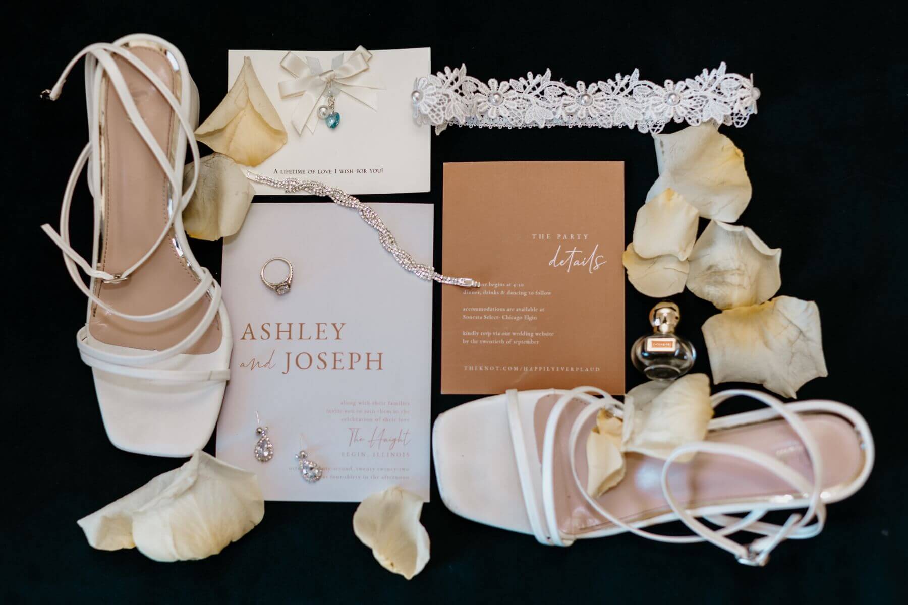 Boho wedding invitation with white satin wedding shoes, garter, and rings