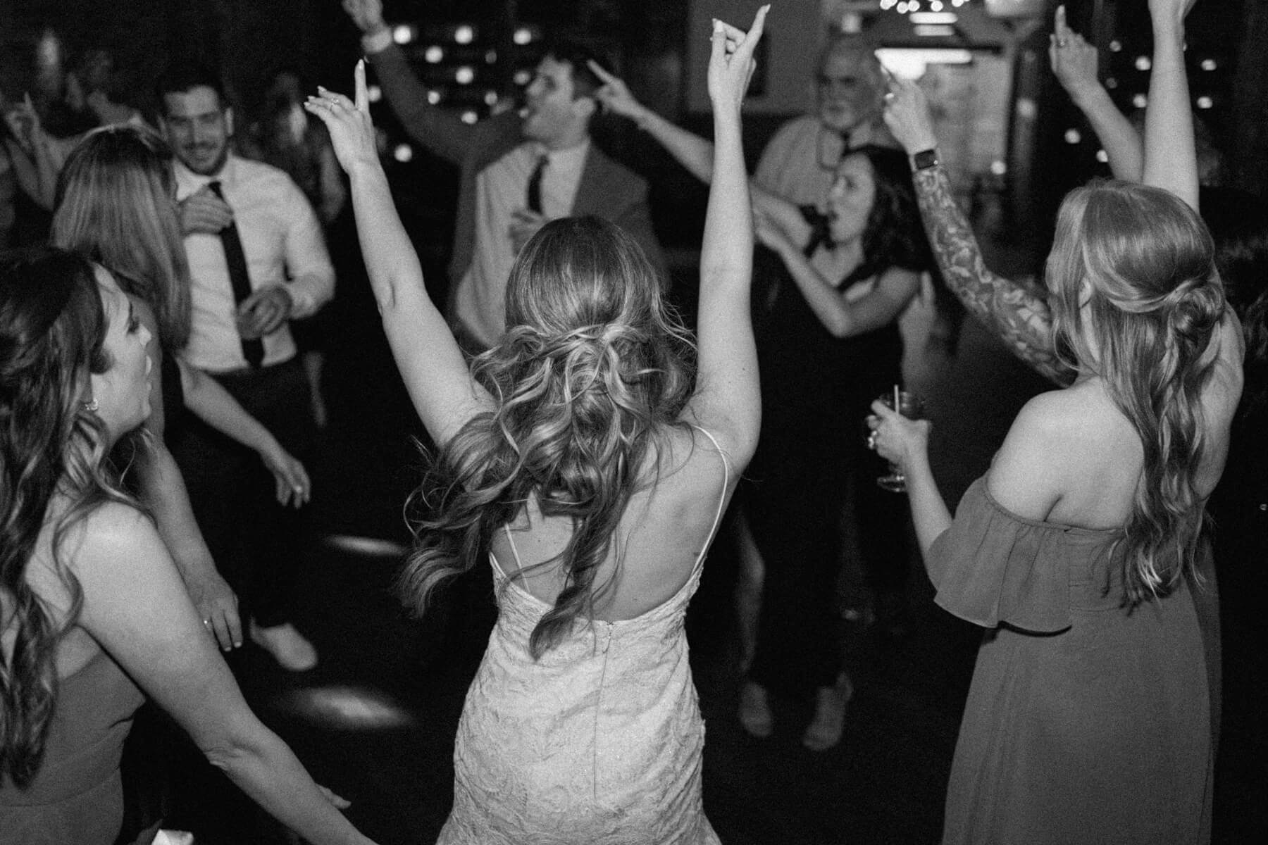 Bride dancing with guests at The Haight